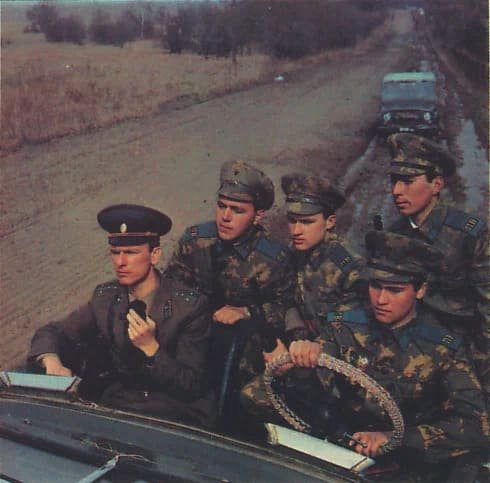 Soviet border guards wearing camouflage uniforms during field patrol in the 1970s Cold War period