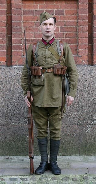 Soviet soldier in full field uniform with rifle and webbing system, Cold War era