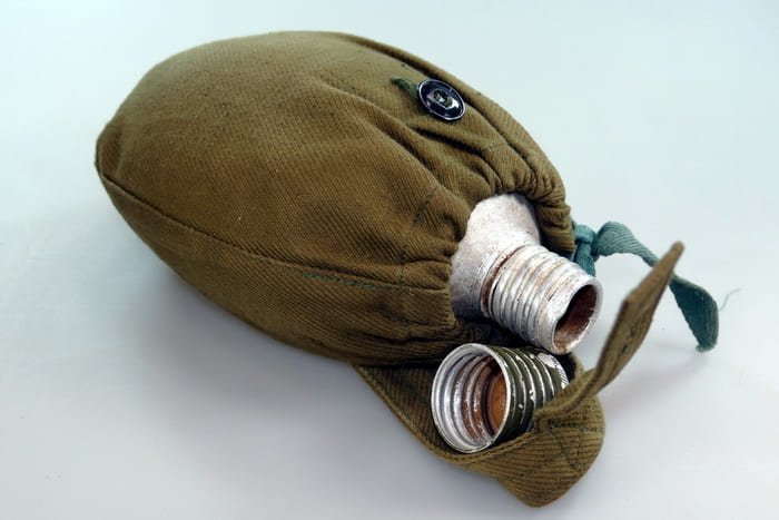Soviet Red Army aluminum canteen model 1932 with fabric cover, worn on the belt, 1941