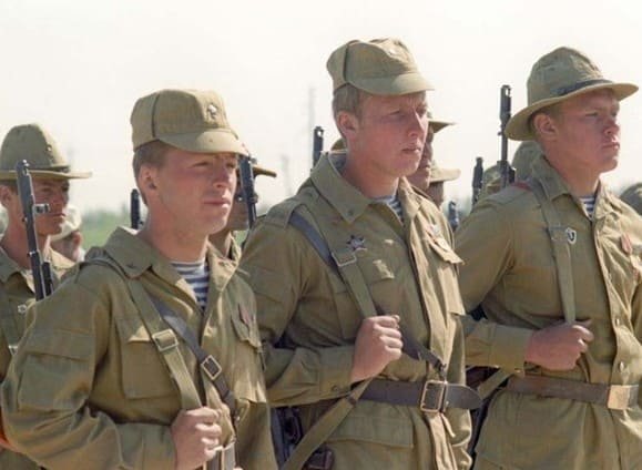 Soviet Army soldiers in Afghan War uniforms standing in formation