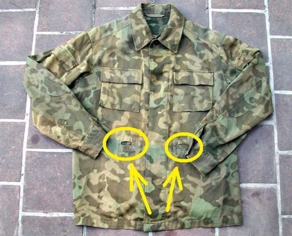 Suspender attachment holes on Soviet Butan camouflage jacket front