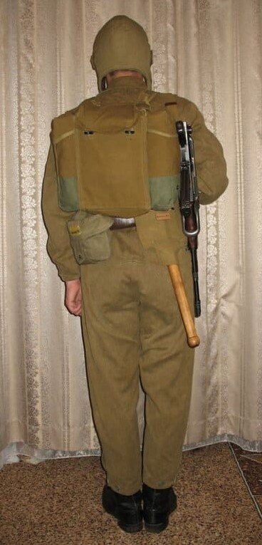 Soviet paratrooper wearing RD-54 airborne backpack in standard field configuration, rear view