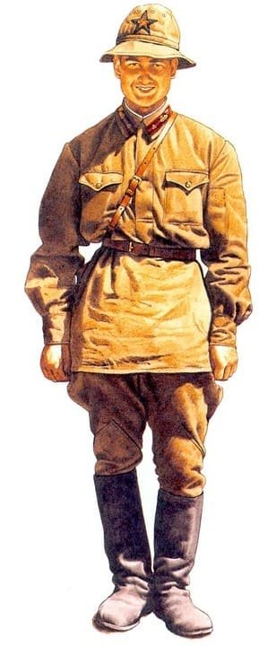 Junior sergeant of a Soviet tank regiment wearing Red Army tanker uniform with steel helmet, USSR, July 1941