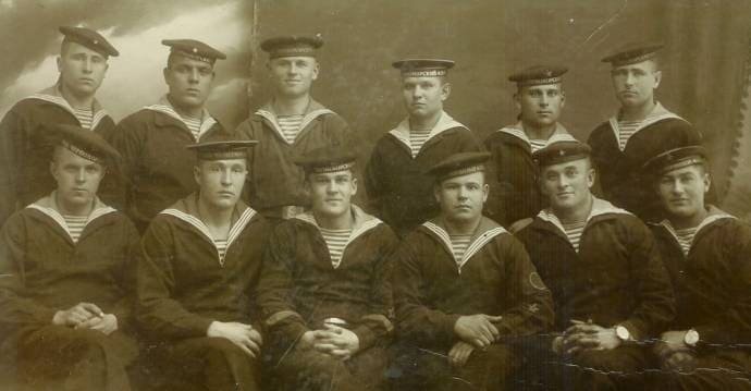 19th century sailors wearing early telnyashka striped shirts under Dutch naval uniform with deep V-neck jackets