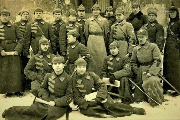 Red Guard fighters during the Russian Civil War wearing early improvised uniforms and insignia