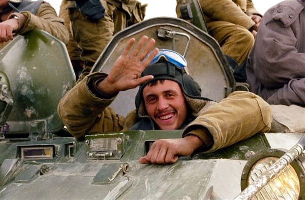 Soviet tank driver in winter Afghanka uniform wearing improvised swimming goggles during the Afghan War