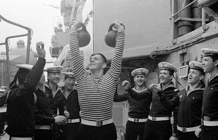 Soviet Navy sailors wearing telnyashka striped shirts on board ship USSR naval fleet