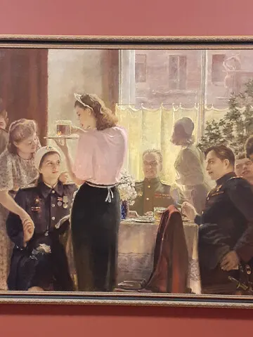 WW2 Soviet Army uniform: wartime social gathering with Soviet officers and women (historical painting)