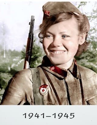 Soviet soldier uniform WW2: woman in Red Army field uniform with rifle, 1941-1945