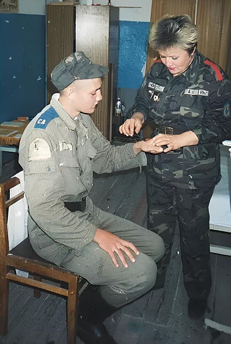 GDR army soldier wearing East German military uniform DDR