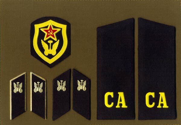 Soviet automobile and road troops sleeve patch, collar tabs with transport troops emblem and private shoulder boards of USSR Army uniform 1988