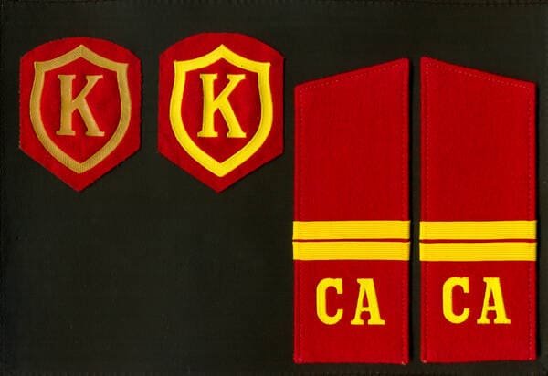 Soviet commandant unit sleeve insignia with letter K and junior sergeant shoulder boards of USSR Army uniform 1969-1988