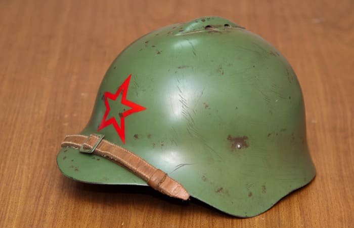 Soviet SSh-36 steel helmet with red star insignia, early Red Army design before World War II