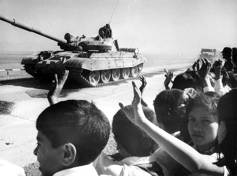 Soviet troops withdrawal from Afghanistan 1989 tank civilians waving