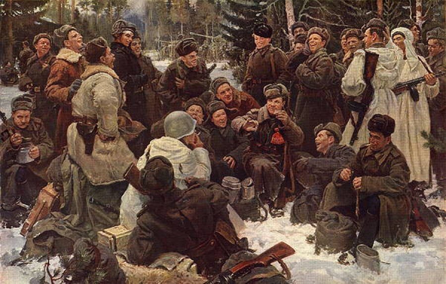 Soviet soldiers eating together in winter field conditions during World War II