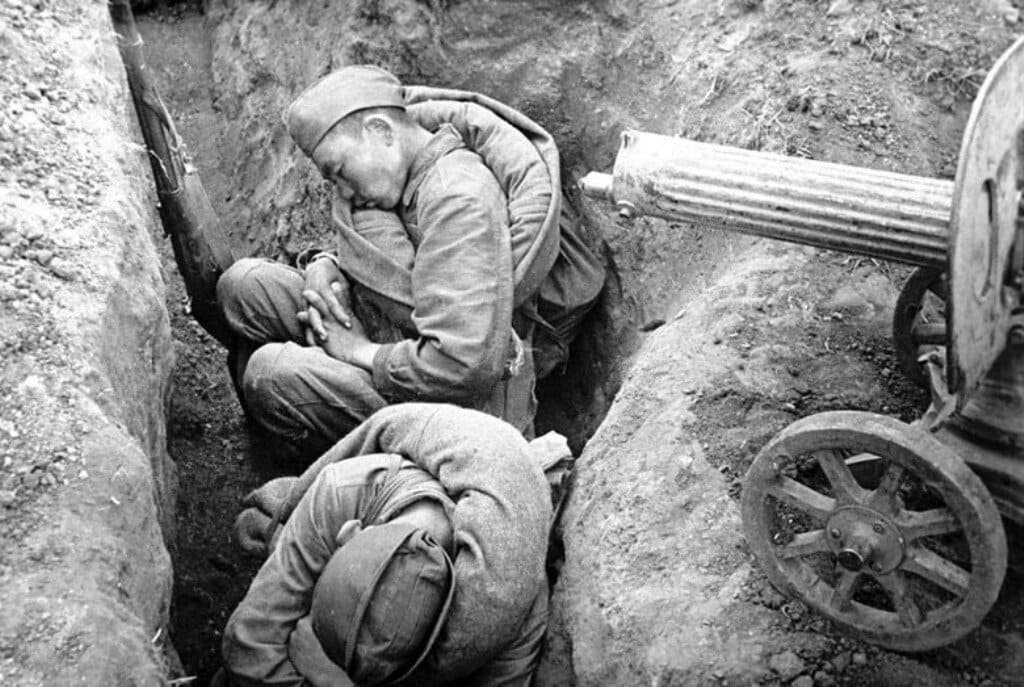 Soviet soldiers sleeping in trenches on the Central Front during World War II, 1943