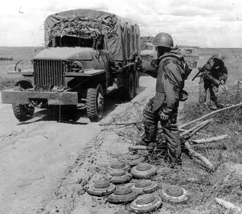 Soviet engineers in camouflage working with mines WW2 Red Army