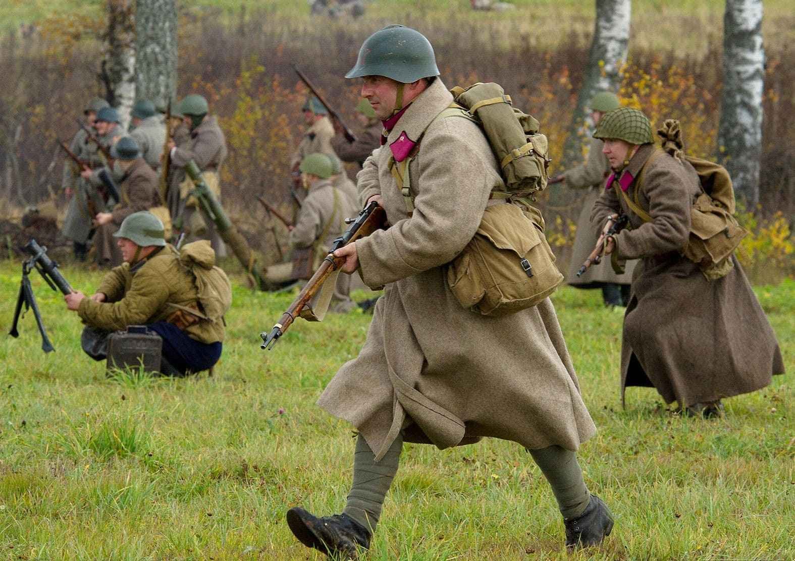 WWII reenacting Red Army soldiers advancing attack