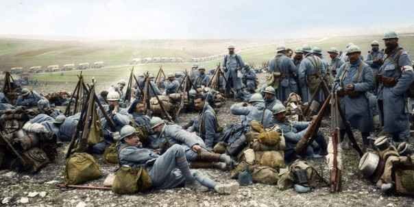 French soldiers resting in trenches wearing puttees and blue uniforms during World War 1