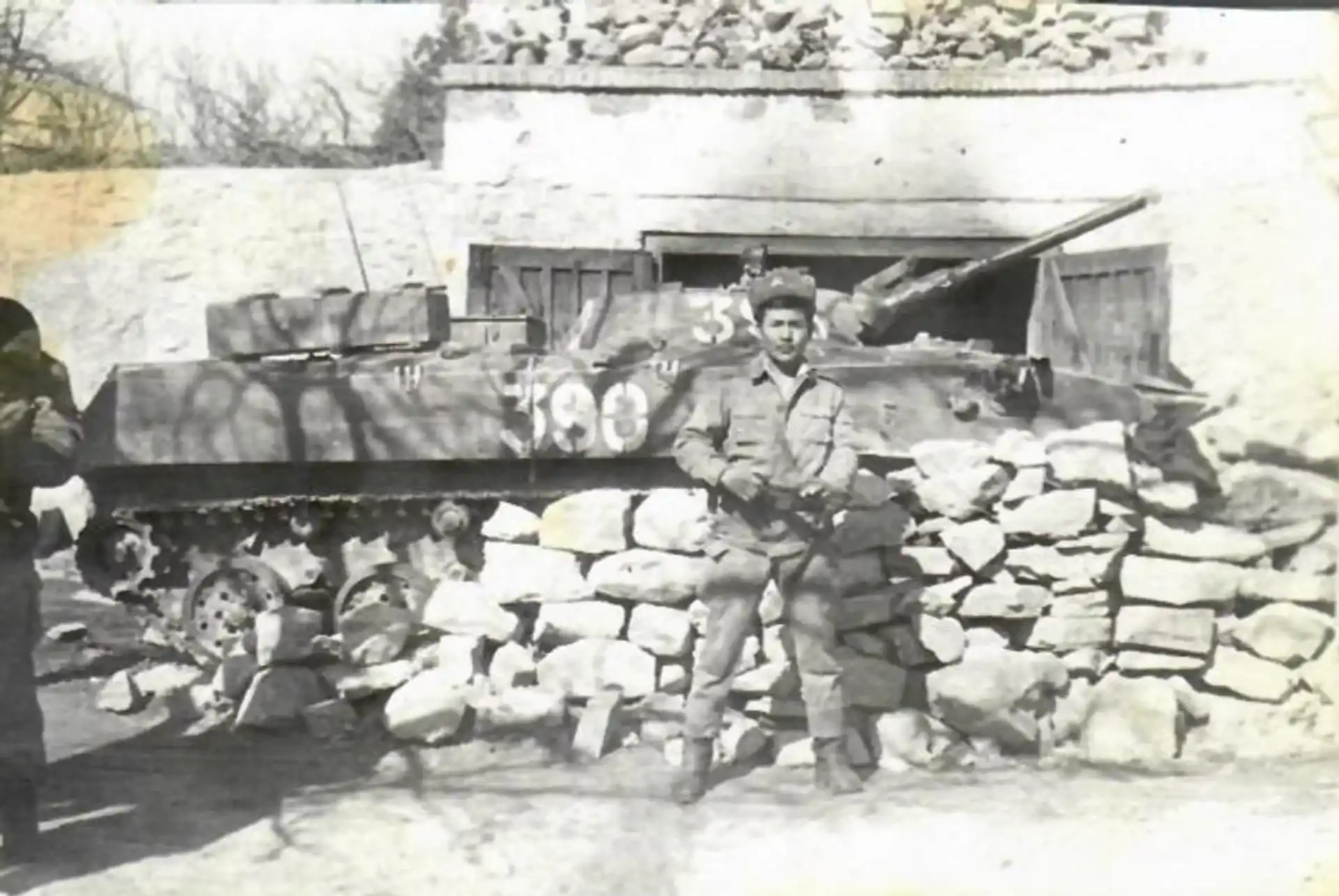 Young Soviet VDV soldier near a BMD vehicle during the Afghan War