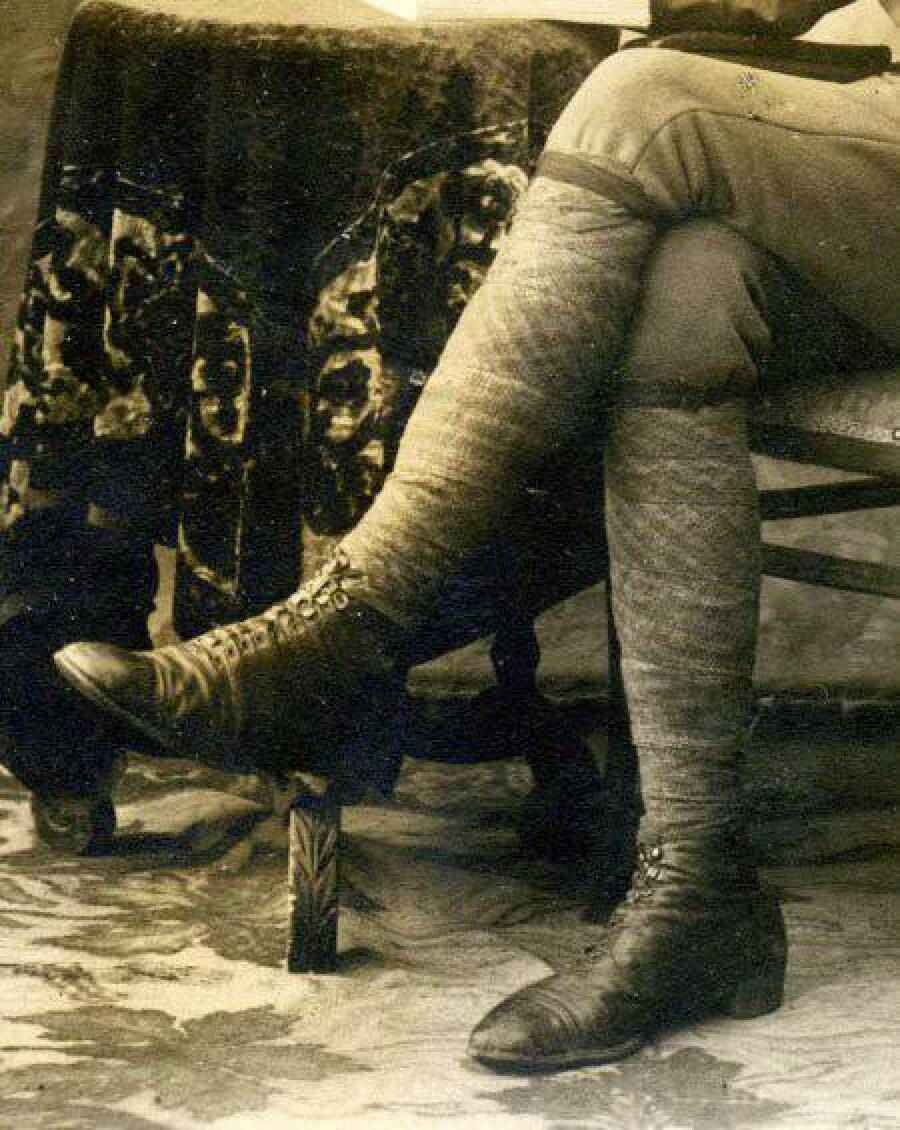 World War I soldier wearing ankle boots with military puttees wrapped around the lower legs
