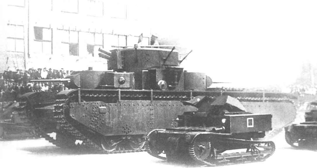 Soviet T-27 tankettes accompanying T-35 heavy tanks at a parade in Kharkov in 1933
