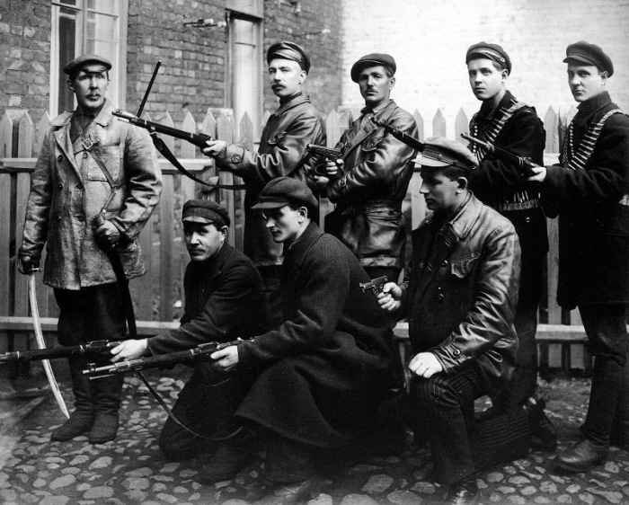 Armed Cheka and Red Army men in mixed Civil War clothing