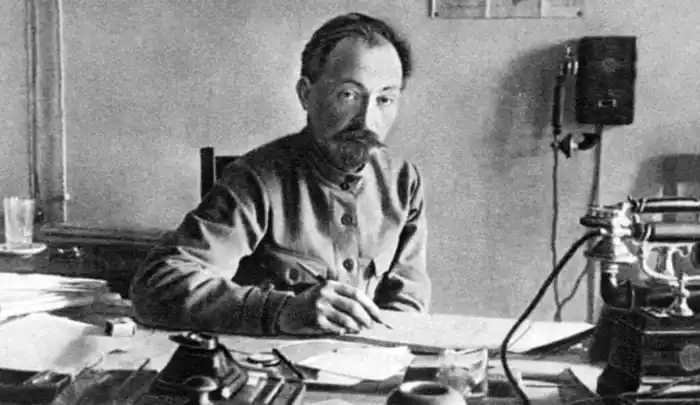 Felix Dzerzhinsky seated at his desk