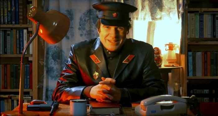 Film character dressed as an NKVD officer in a leather coat