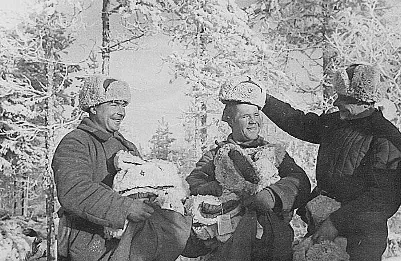 Soviet Red Army soldiers wearing winter ushanka hats
